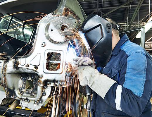 Vehicle towing and body repair coordination